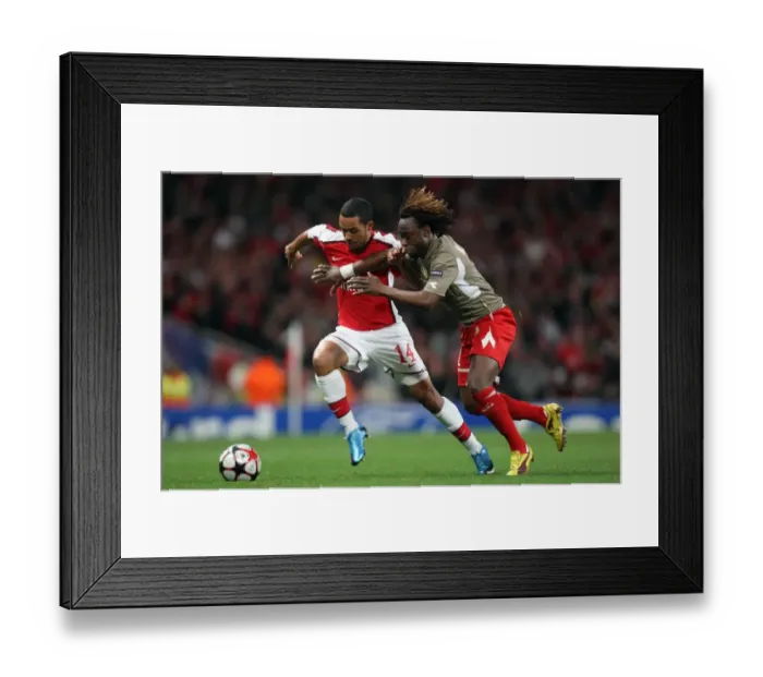 Framed Print : Theo Walcott Scores Double as Arsenal Tops Standard Liege 2-0 in Champions League Framed Print : Theo Walcott Scores Double as Arsenal Tops Standard Liege 2-0 in Champions League
