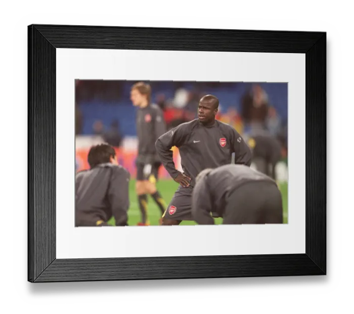 Framed Print : Emmanuel Eboue (Arsenal). Real Madrid 0: 1 Arsenal. UEFA Champions League Framed Print : Emmanuel Eboue (Arsenal). Real Madrid 0: 1 Arsenal. UEFA Champions League