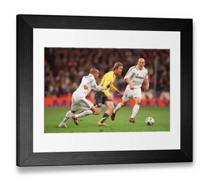 Framed Print : Alex Hleb Stuns Real Madrid: Arsenal's Historic 1-0 Win Over Real Madrid in the Champions League Framed Print : Alex Hleb Stuns Real Madrid: Arsenal's Historic 1-0 Win Over Real Madrid in the Champions League