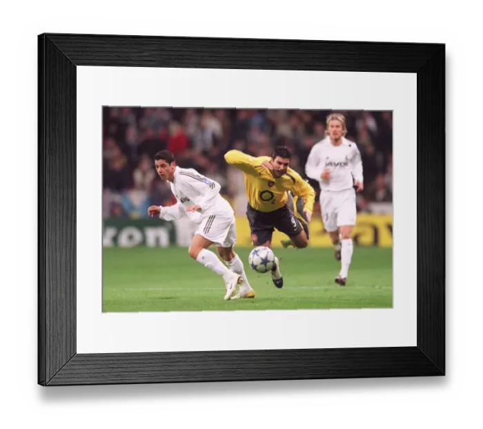 Framed Print : Jose Reyes Scores the Upset: Arsenal's 1-0 Victory over Real Madrid in the Champions League Framed Print : Jose Reyes Scores the Upset: Arsenal's 1-0 Victory over Real Madrid in the Champions League