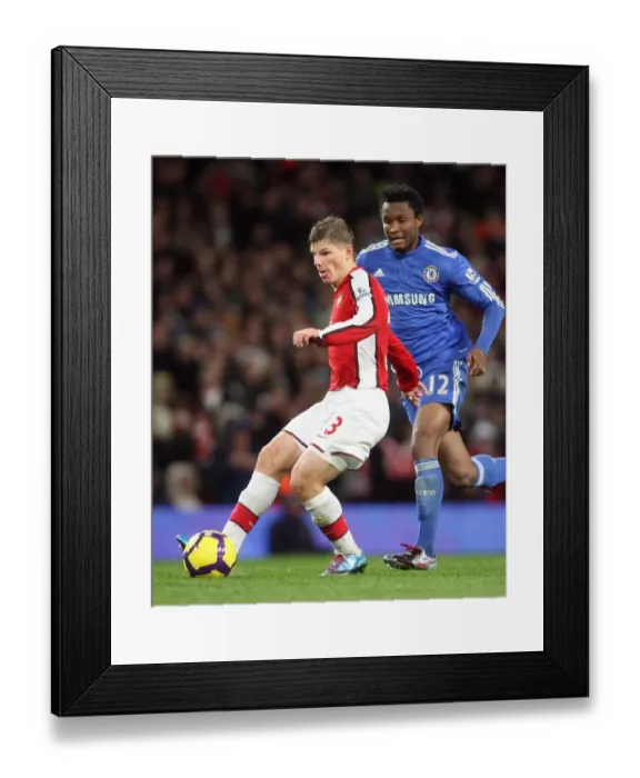 Framed Print : Andrey Arshavin (Arsenal) Jon Obi Mikel (Chelsea). Arsenal 0: 3 Chelsea Framed Print : Andrey Arshavin (Arsenal) Jon Obi Mikel (Chelsea). Arsenal 0: 3 Chelsea