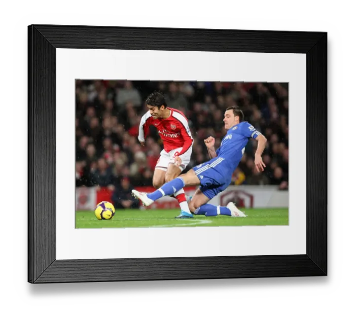 Framed Print : Eduardo vs John Terry: Chelsea's Dominance over Arsenal in the 2009-10 Barclays Premier League (3-0) Framed Print : Eduardo vs John Terry: Chelsea's Dominance over Arsenal in the 2009-10 Barclays Premier League (3-0)
