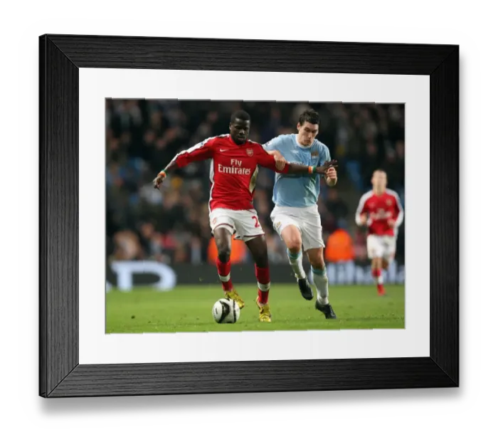 Framed Print : Emmanuel Eboue (Arsenal) Gareth Barry (Man City). Manchester City 3: 0 Arsenal