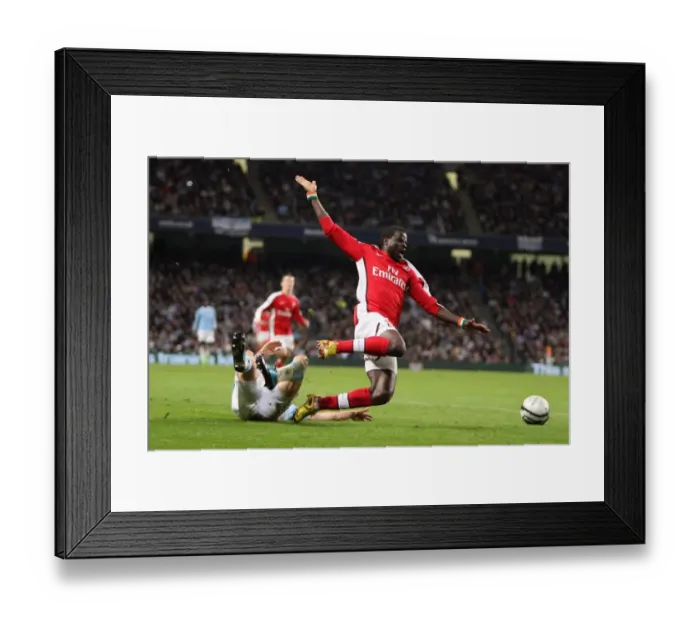 Framed Print : Emmanuel Eboue (Arsenal) Craig Bellamy (Man City). Manchester City 3: 0 Arsenal Framed Print : Emmanuel Eboue (Arsenal) Craig Bellamy (Man City). Manchester City 3: 0 Arsenal