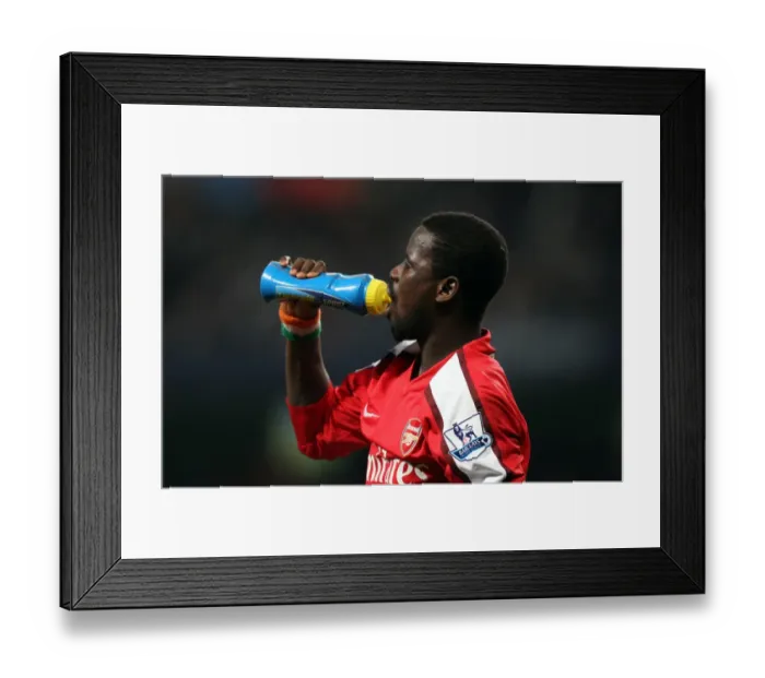 Framed Print : Manchester City Crushes Arsenal 3-0 in Carling Cup Showdown: Emmanuel Eboue's Struggle Framed Print : Manchester City Crushes Arsenal 3-0 in Carling Cup Showdown: Emmanuel Eboue's Struggle