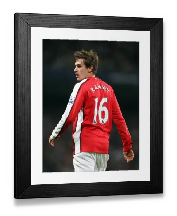 Framed Print : Manchester City Triumphs Over Arsenal: Aaron Ramsey in Carling Cup 5th Round Clash (3-0)