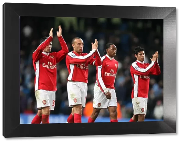 (L>R) Fran Merida, Mikael Silvestre, Sanchez Watt and Carlos Vela (Arsenal) clap the fans after the match. Manchester City 3: 0 Arsenal. Carlin Cup 5th Round. City of Manchester Stadium, 2  /  12  /  09. Credit : Arsenal Football Club