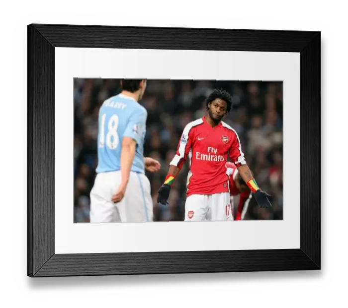 Framed Print : Alex Song vs Manchester City: Arsenal's Defensive Midfielder Faces a Tough Night in the 2009-10 Carling Cup 5th Round