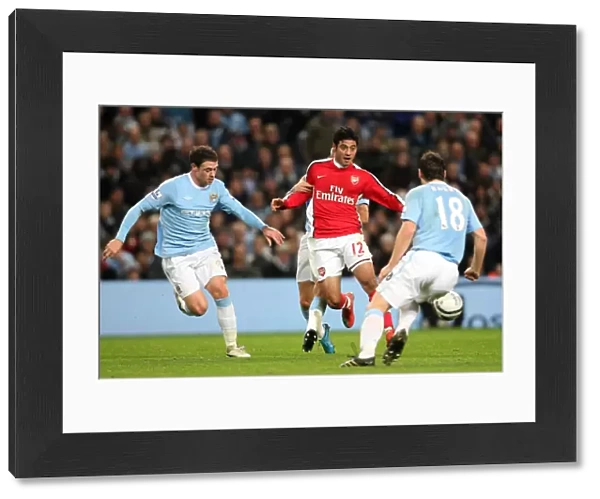 Carlos Vela (Arsenal) Wayne Bridge and Gareth Barry (Man City). Manchester City 3