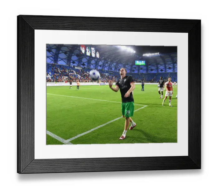 Framed Print : Arsenal's Bernd Leno Throws Balls to Dubai Fans after Al-Nasr Friendly Match