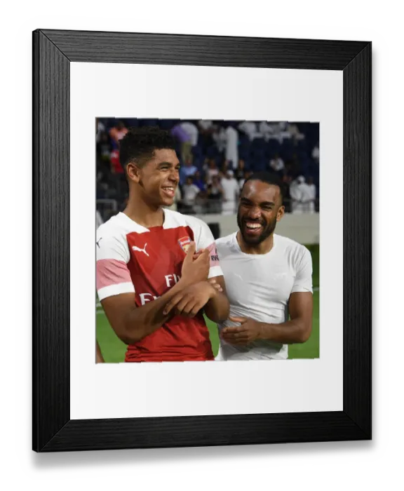 Framed Print : Arsenal's John-Jules and Lacazette Celebrate Friendly Win Against Al-Nasr Dubai SC Framed Print : Arsenal's John-Jules and Lacazette Celebrate Friendly Win Against Al-Nasr Dubai SC