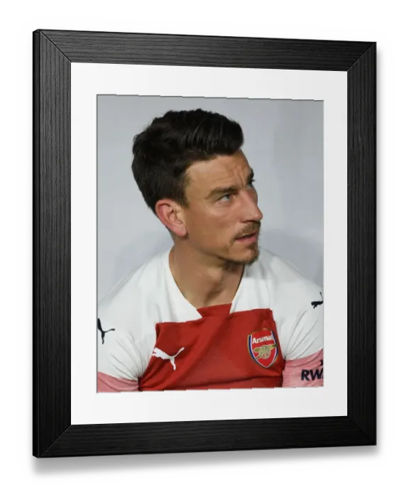 Framed Print : Laurent Koscielny in Action: Arsenal vs Al-Nasr Dubai SC (2018-19)