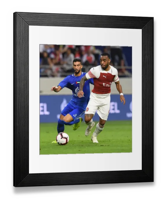 Framed Print : Al-Nasr Dubai SC vs. Arsenal: Lacazette and Khamis Clash in Friendly Match Framed Print : Al-Nasr Dubai SC vs. Arsenal: Lacazette and Khamis Clash in Friendly Match