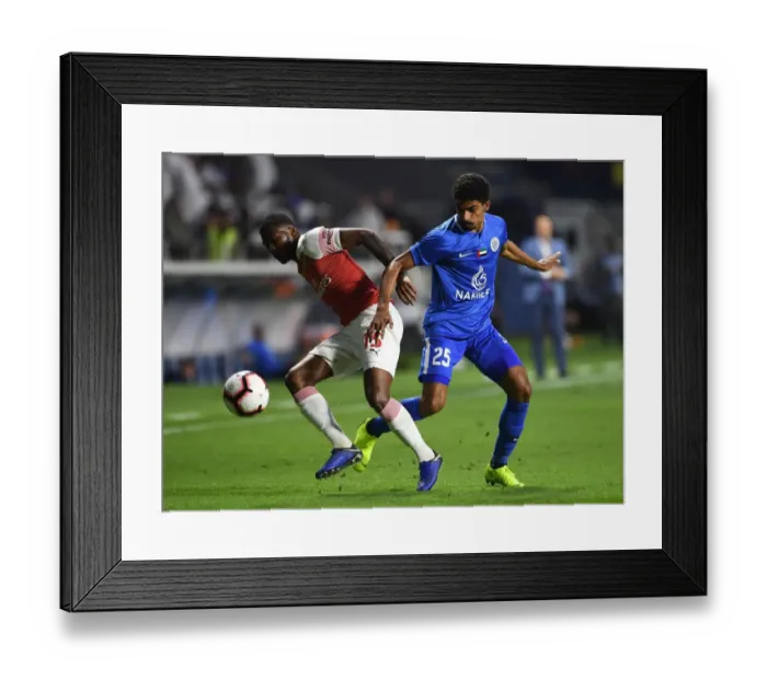 Framed Print : Maitland-Niles vs. Jashak: A Talent-Filled Clash - Al-Nasr Dubai SC vs. Arsenal (2018-19) Framed Print : Maitland-Niles vs. Jashak: A Talent-Filled Clash - Al-Nasr Dubai SC vs. Arsenal (2018-19)