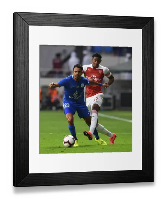 Framed Print : Arsenal's Zech Medley in Action Against Al-Nasr Dubai SC (2018-19) Framed Print : Arsenal's Zech Medley in Action Against Al-Nasr Dubai SC (2018-19)