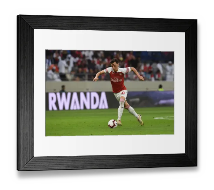 Framed Print : Mesut Ozil in Action: Arsenal vs Al-Nasr Dubai SC (2018-19)