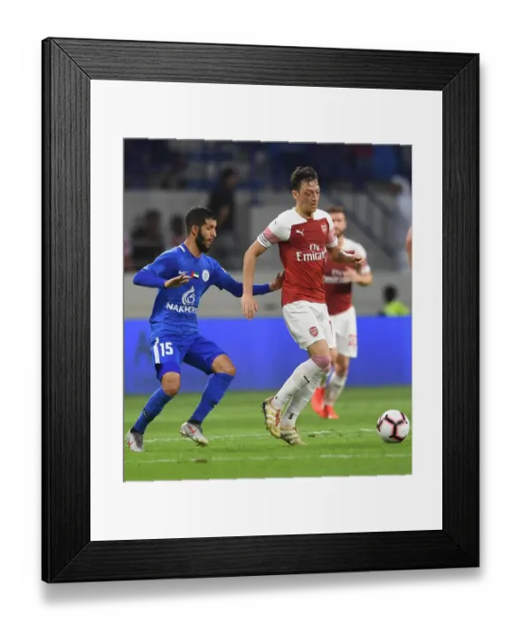 Framed Print : Mesut Ozil: In Action for Arsenal against Al-Nasr Dubai SC (2018-19) Framed Print : Mesut Ozil: In Action for Arsenal against Al-Nasr Dubai SC (2018-19)