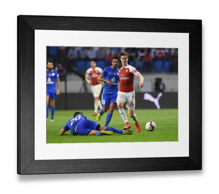 Framed Print : Al-Nasr Dubai SC vs. Arsenal: Clash Between Masoud Sulaiman and Ben Sheaf