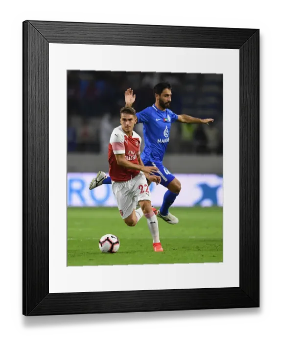 Framed Print : Denis Suarez vs. Khalid Jalal: Clash of the Stars in Al-Nasr Dubai SC vs. Arsenal Friendly Framed Print : Denis Suarez vs. Khalid Jalal: Clash of the Stars in Al-Nasr Dubai SC vs. Arsenal Friendly