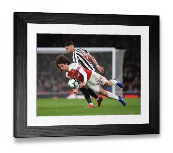 Framed Print : Guendouzi vs Perez: A Premier League Battle at Emirates Stadium Framed Print : Guendouzi vs Perez: A Premier League Battle at Emirates Stadium