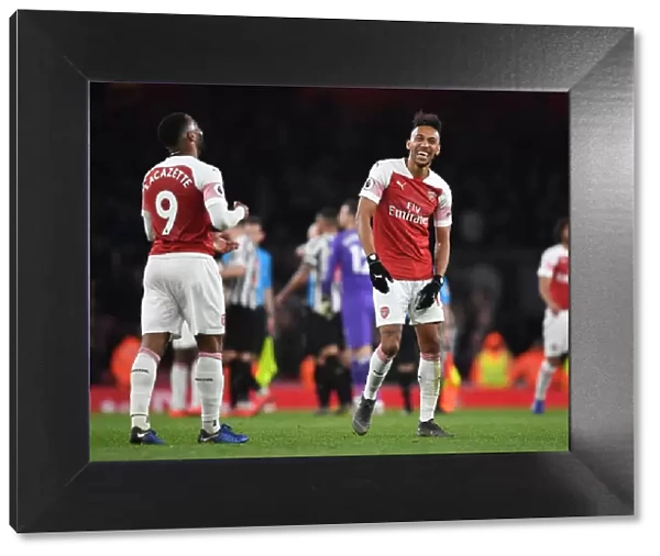 Arsenal's Double Trouble: Lacazette and Aubameyang Celebrate Victory over Newcastle United