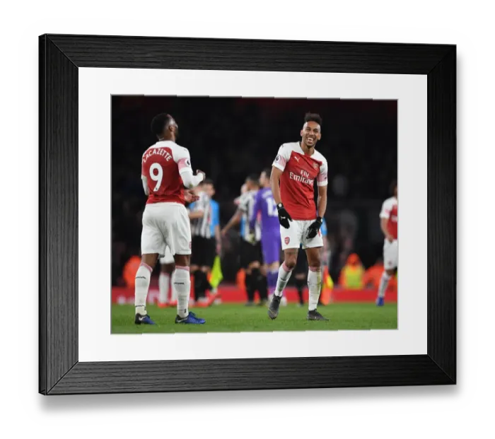 Framed Print : Arsenal's Double Trouble: Lacazette and Aubameyang Celebrate Victory over Newcastle United Framed Print : Arsenal's Double Trouble: Lacazette and Aubameyang Celebrate Victory over Newcastle United