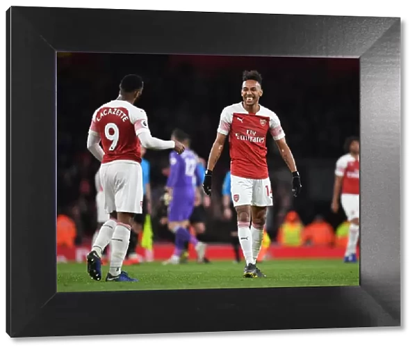 Arsenal's Lacazette and Aubameyang Celebrate Victory over Newcastle United in the Premier League