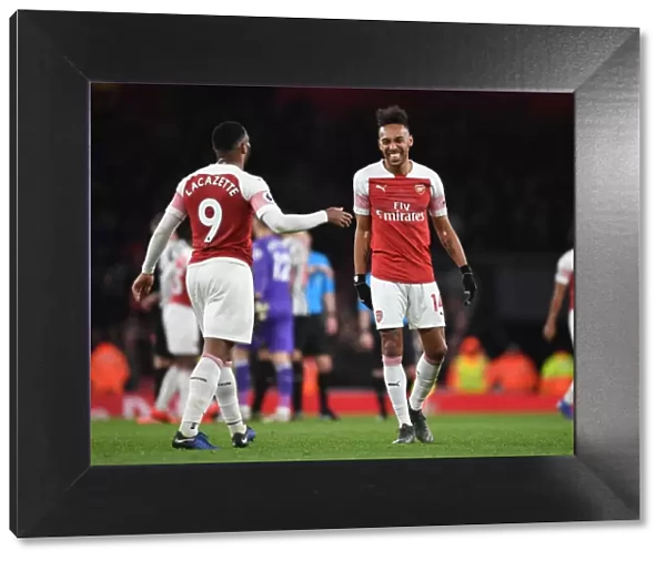 Arsenal's Lacazette and Aubameyang: Celebrating Glory over Newcastle United in the Premier League