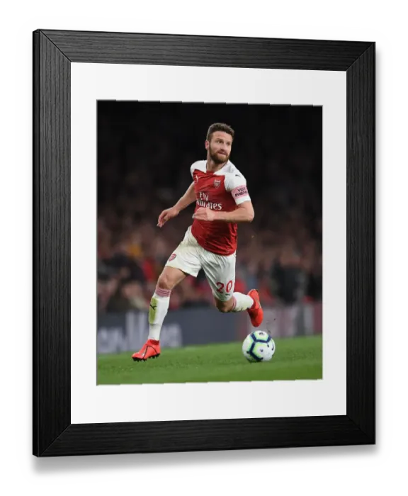 Framed Print : Shkodran Mustafi Focuses in Arsenal's Battle Against Newcastle United, Premier League 2018-19