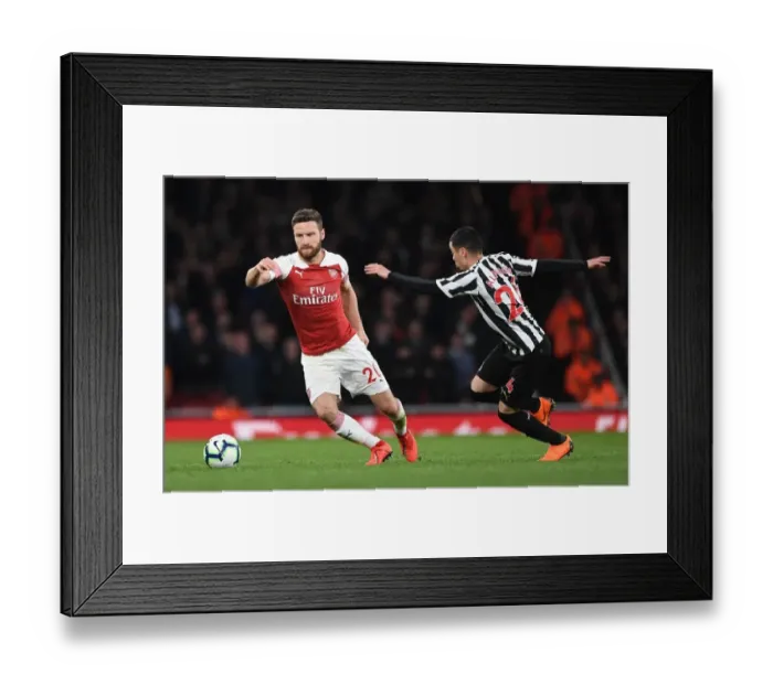 Framed Print : Mustafi Outmuscles Almiron: Arsenal vs Newcastle United, Premier League 2018-19