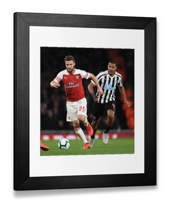 Framed Print : Mustafi Outmuscles Rondon: Arsenal vs Newcastle United, Premier League 2018-19 Framed Print : Mustafi Outmuscles Rondon: Arsenal vs Newcastle United, Premier League 2018-19