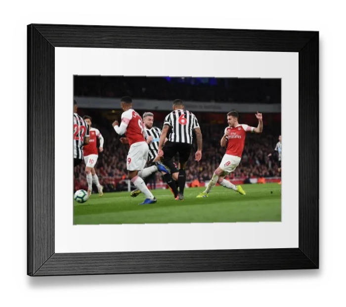 Framed Print : Aaron Ramsey Scores for Arsenal Against Newcastle United in Premier League Framed Print : Aaron Ramsey Scores for Arsenal Against Newcastle United in Premier League