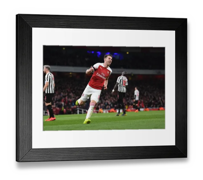 Framed Print : Arsenal's Aaron Ramsey: Thrilling Goal Celebration Secures Victory Over Newcastle United, Premier League 2018-19 Framed Print : Arsenal's Aaron Ramsey: Thrilling Goal Celebration Secures Victory Over Newcastle United, Premier League 2018-19