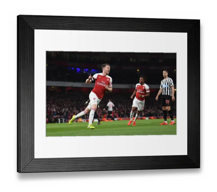 Framed Print : Ramsey's Thrilling Goal: Arsenal's Triumph Over Newcastle United, Premier League 2018-19 Framed Print : Ramsey's Thrilling Goal: Arsenal's Triumph Over Newcastle United, Premier League 2018-19