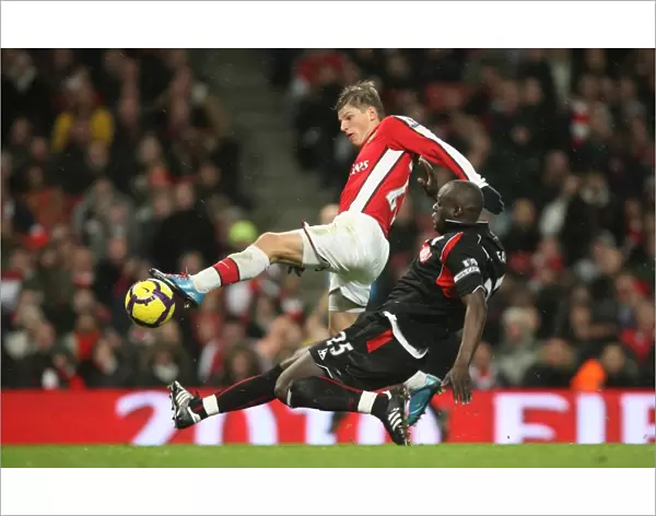 Andrey Arshavin (Arsenal) Abdoulaye Faye (Stoke). Arsenal 2: 0 Stoke City