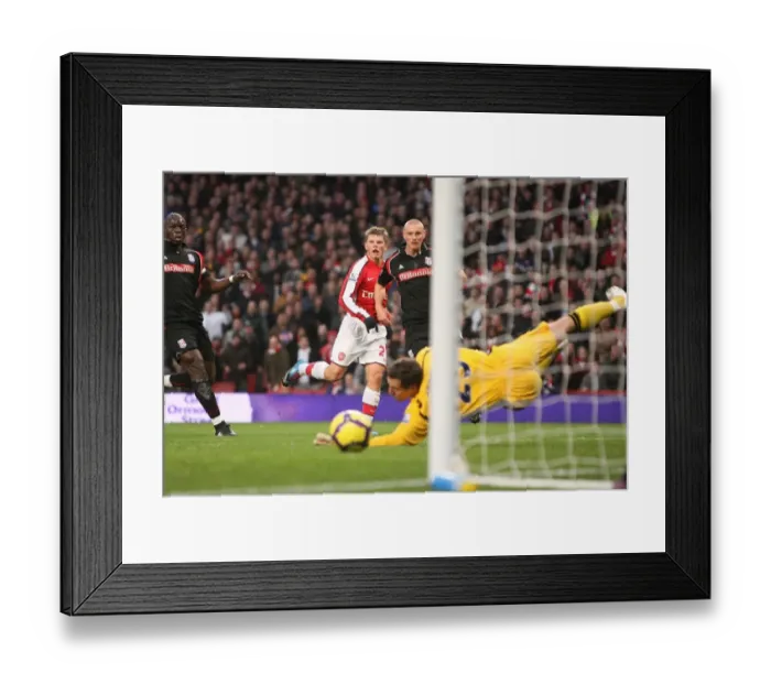 Framed Print : Arshavin's Stunner: Arsenal's First Goal in Emirates Win Against Stoke City (5-12-2009) Framed Print : Arshavin's Stunner: Arsenal's First Goal in Emirates Win Against Stoke City (5-12-2009)