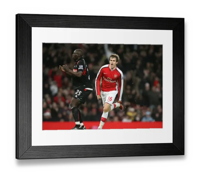Framed Print : Aaron Ramsey celebrates scoring the 2nd Arsenal goal. Arsenal 2: 0 Stoke City
