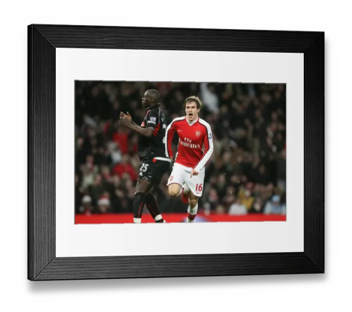 Framed Print : Aaron Ramsey's Brace: Arsenal's 2-0 Victory Over Stoke City Framed Print : Aaron Ramsey's Brace: Arsenal's 2-0 Victory Over Stoke City