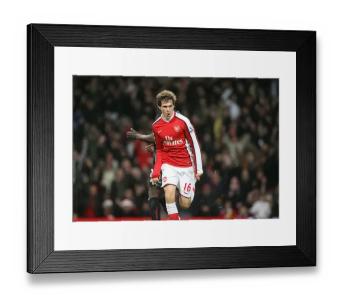 Framed Print : Arsenal's Unstoppable Ramsey: 2-Goal Blitz Against Stoke City (5-12-2009)