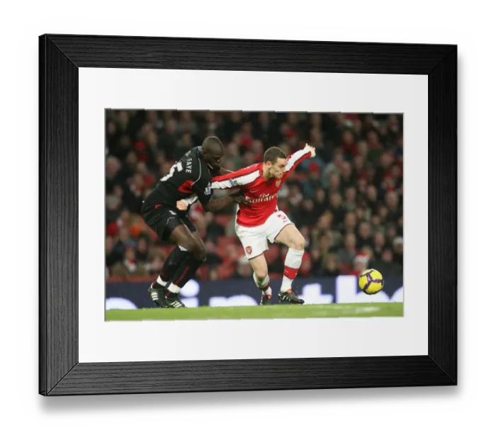 Framed Print : Thomas Vermaelen (Arsenal) Abdoulaye Faye (Stoke City). Arsenal 2: 0 Stoke City Framed Print : Thomas Vermaelen (Arsenal) Abdoulaye Faye (Stoke City). Arsenal 2: 0 Stoke City