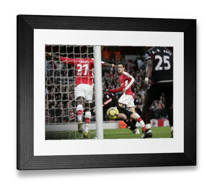 Framed Print : Emmanuel Eboue (Arsenal) accidentally blocks a goalbound shoot from Cesc Fabregas Framed Print : Emmanuel Eboue (Arsenal) accidentally blocks a goalbound shoot from Cesc Fabregas
