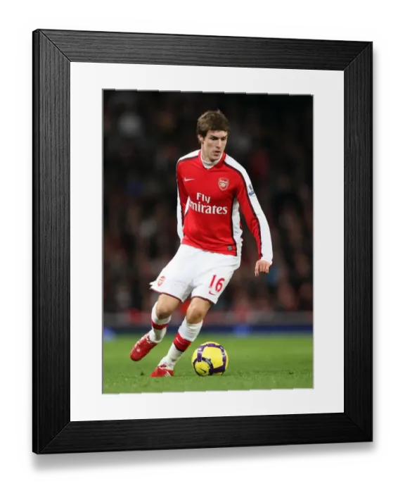 Framed Print : Aaron Ramsey (Arsenal). Arsenal 2: 0 Stoke City. Barclays Premier League Framed Print : Aaron Ramsey (Arsenal). Arsenal 2: 0 Stoke City. Barclays Premier League