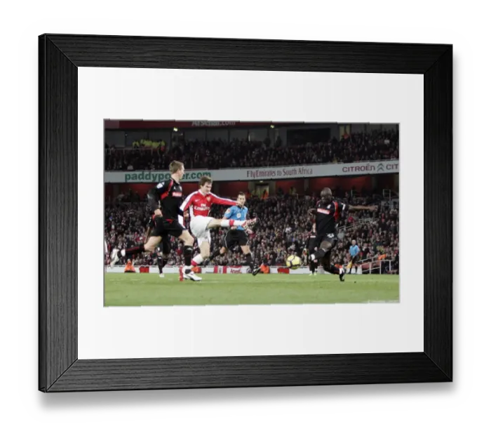 Framed Print : Aaron Ramsey Scores Arsenal's Second Goal Against Stoke City Amidst Pressure from Abdoulaye Faye and Danny Collins