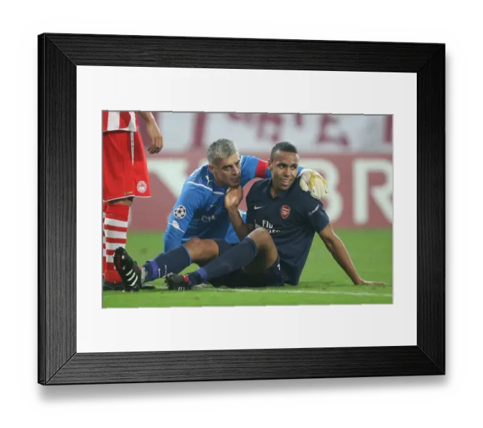 Framed Print : Kyle Bartley (Arsenal) Antonis Nikopolidis (Olympiacos). Olympiacos 1: 0 Arsenal Framed Print : Kyle Bartley (Arsenal) Antonis Nikopolidis (Olympiacos). Olympiacos 1: 0 Arsenal