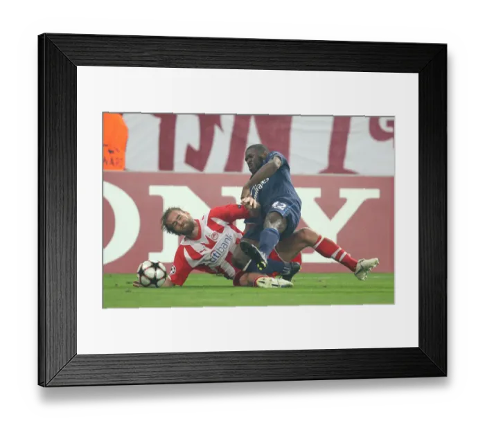Framed Print : Kerrea Gilbert (Arsenal) Olof Mellberg (Olympiacos). Olympiacos 1: 0 Arsenal