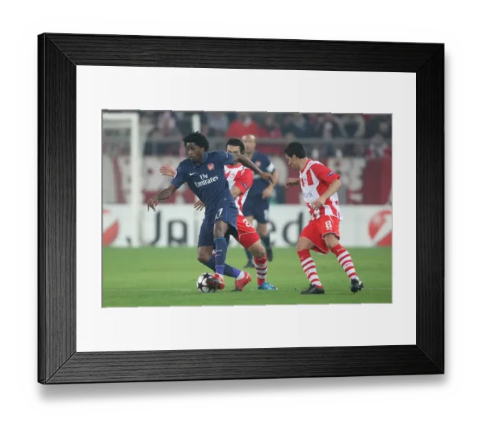 Framed Print : Alex Song's Brilliant Performance: Arsenal's 1-0 Win Over Olympiacos in Champions League Group H