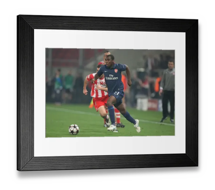 Framed Print : Arsenal's Gilles Sunu Shines in UEFA Champions League Victory over Olympiacos (9 / 12 / 2009)