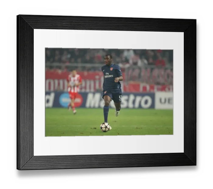 Framed Print : Gilles Sunu's Shining Performance: Arsenal Triumphs over Olympiacos in UEFA Champions League (9 / 12 / 2009) Framed Print : Gilles Sunu's Shining Performance: Arsenal Triumphs over Olympiacos in UEFA Champions League (9 / 12 / 2009)
