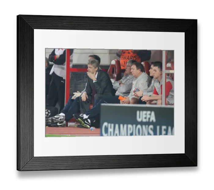 Framed Print : Arsenal manager Arsene Wenger on the bench with assistant Pat Rice and kit man Vic Akers