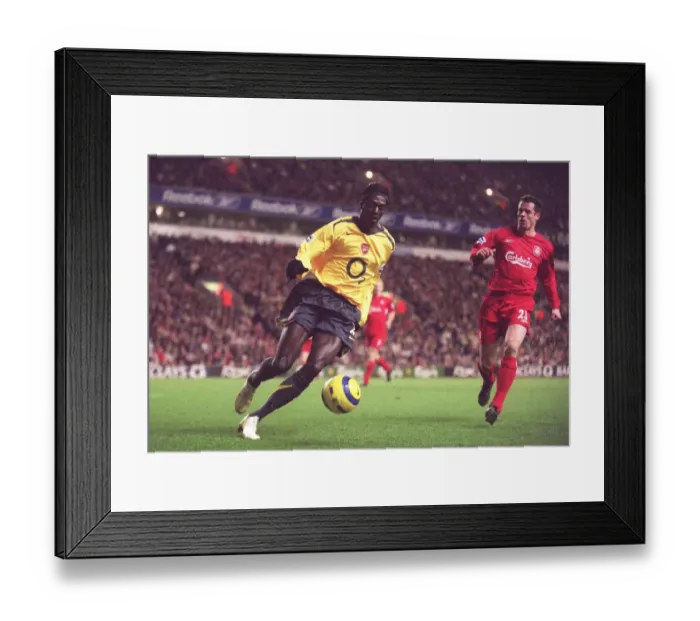 Framed Print : Adebayor vs. Carragher: The Intense Rivalry - Liverpool 1:0 Arsenal, FA Premiership, 2006 Framed Print : Adebayor vs. Carragher: The Intense Rivalry - Liverpool 1:0 Arsenal, FA Premiership, 2006
